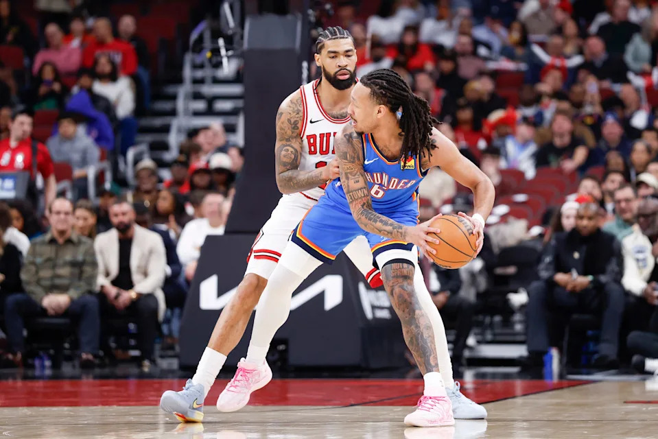 Mar 3, 2026; Chicago, Illinois, USA; Chicago Bulls center Nick Richards (13) defends against Oklahoma City Thunder forward Jaylin Williams (6) during the first half at United Center. Mandatory Credit: Kamil Krzaczynski-Imagn Images
