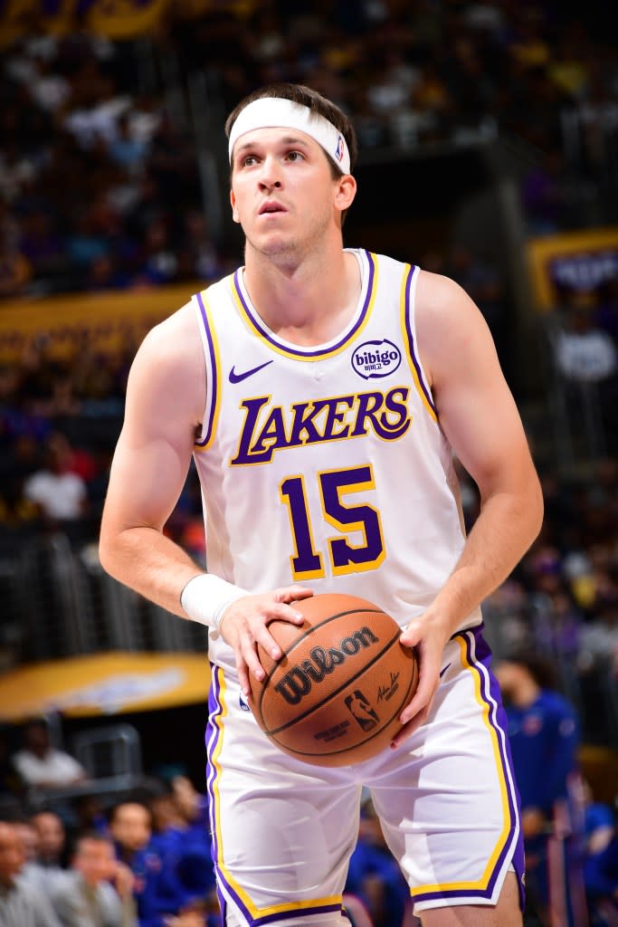 Austin Reaves shoots a free throw against the New York Knicks. NBAE via Getty Images