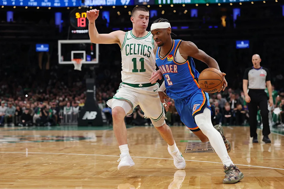 BOSTON, MASSACHUSETTS - MARCH 25: Shai Gilgeous-Alexander #2 of the Oklahoma City Thunder drives to the basket against Payton Pritchard #11 of the Boston Celtics during the second half at TD Garden on March 25, 2026 in Boston, Massachusetts. The Celtics defeat the Thunder 119-109. NOTE TO USER: User expressly acknowledges and agrees that, by downloading and/or using this Photograph, user is consenting to the terms and conditions of the Getty Images License Agreement. (Photo by Maddie Meyer/Getty Images)