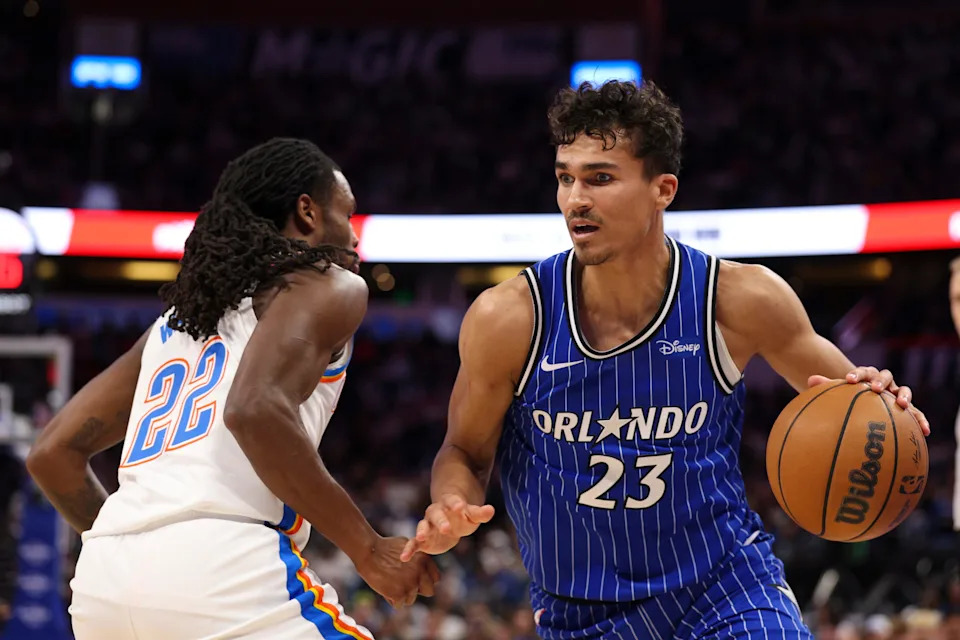 Mar 17, 2026; Orlando, Florida, USA; Orlando Magic forward Tristan da Silva (23) is guarded by Oklahoma City Thunder guard Cason Wallace (22) in the second quarter at Kia Center. Mandatory Credit: Nathan Ray Seebeck-Imagn Images