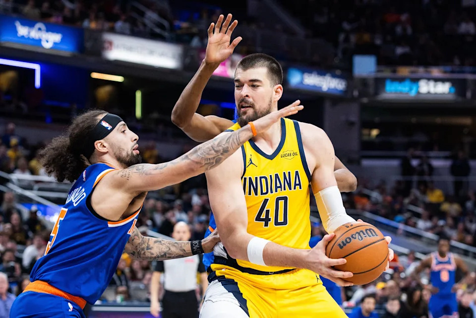 Mar 13, 2026; Indianapolis, Indiana, USA; Indiana Pacers center Ivica Zubac (40) shoots the ball while New York Knicks guard Jose Alvarado (5) defends in the first half at Gainbridge Fieldhouse. Mandatory Credit: Trevor Ruszkowski-Imagn Images