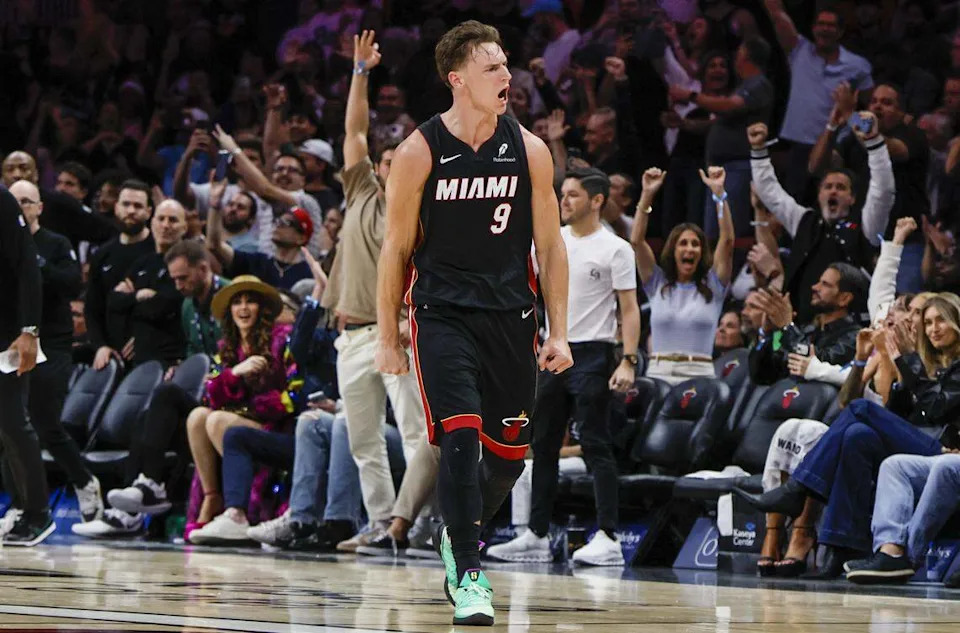 Miami Heat guard Pelle Larsson (9) reacts after sinking a three pointer late in the fourth quarter to seal the game against the Milwaukee Bucks during their NBA basketball game at Kaseya Center in Miami on March 12, 2026.