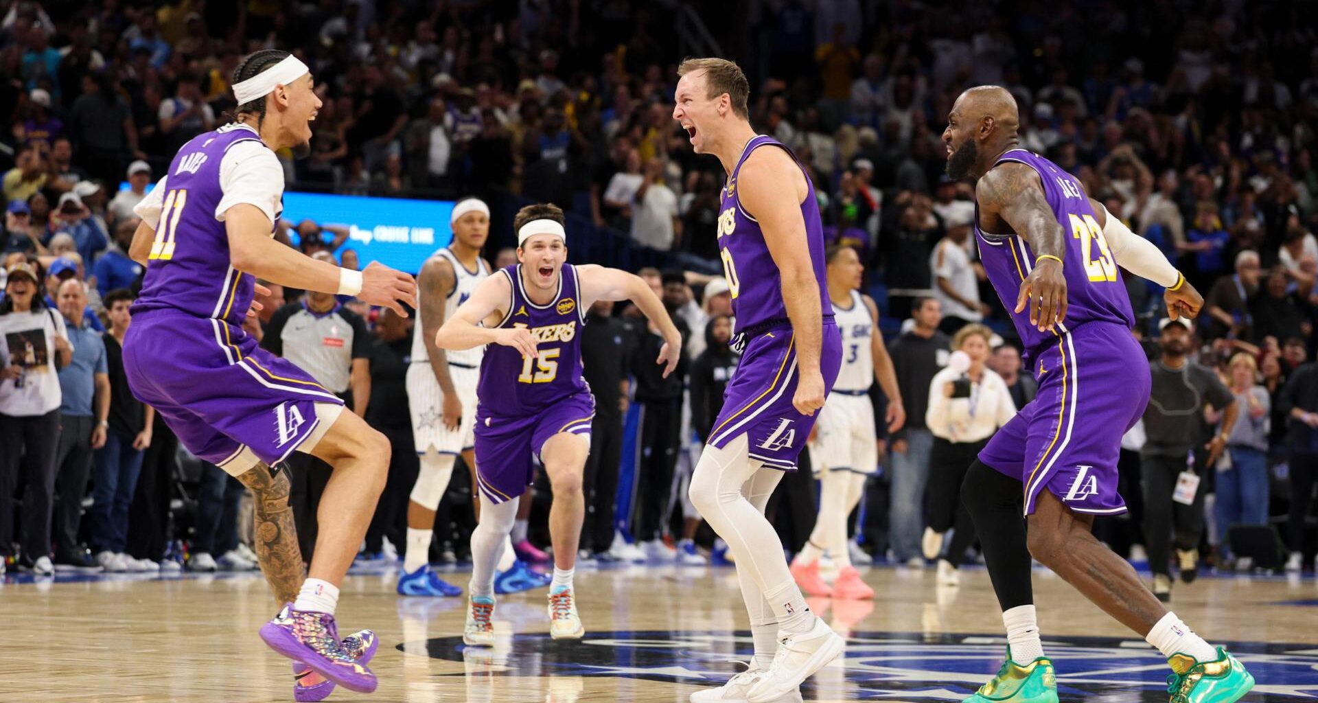 LeBron James breaks NBA mark for games played, Luke Kennard makes winning 3 in Lakers' win vs. Magic