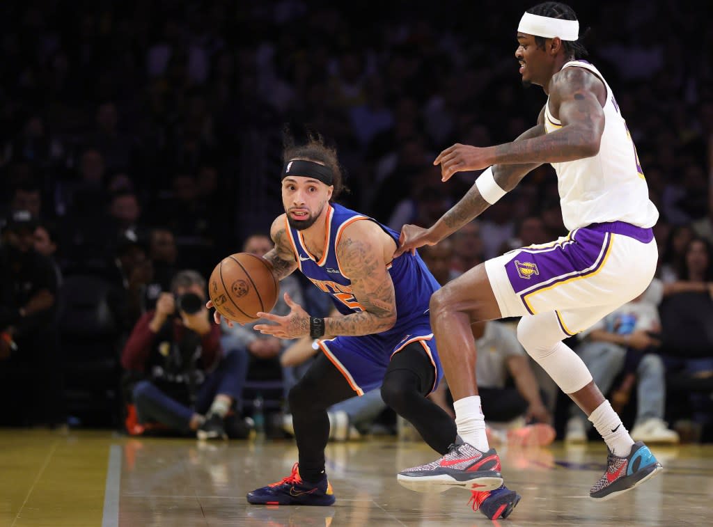 Jose Alvarado #5 of the New York Knicks controls the ball against Jarred Vanderbilt #2 of the Los Angeles Lakers. Getty Images