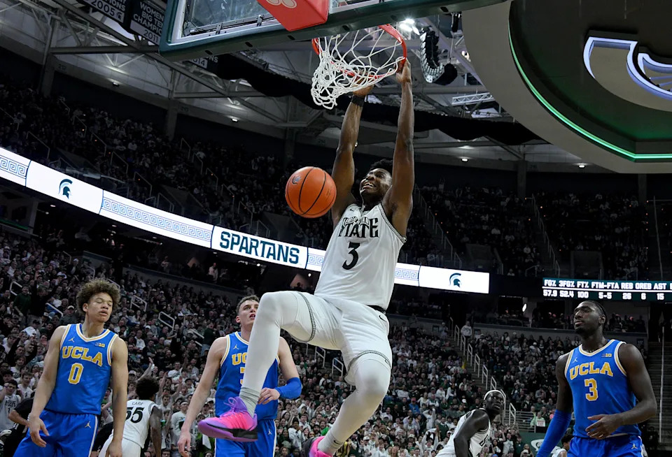 Michigan State Spartans forward Cameron Ward (3) dunks the ball against the UCLA Bruins during the second half at Jack Breslin Student Events Center in East Lansing, Michigan.