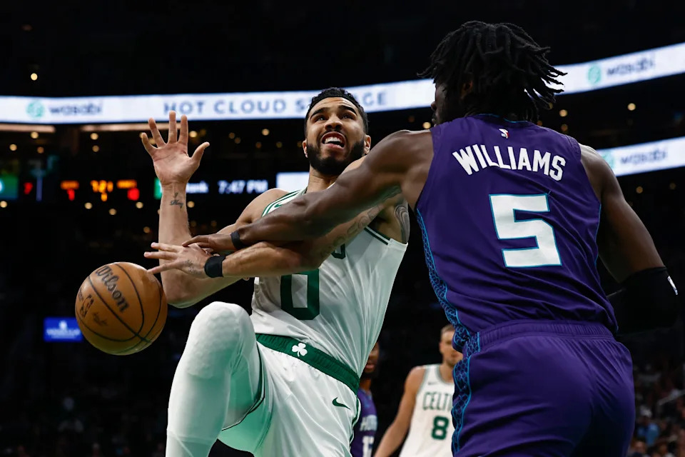 BOSTON, MA - APRIL 11: Mark Williams #5 of the Charlotte Hornets knocks the ball away from Jayson Tatum #0 of the Boston Celtics during the first quarter at TD Garden on April 11, 2025 in Boston, Massachusetts. NOTE TO USER: User expressly acknowledges and agrees that, by downloading and/or using this Photograph, user is consenting to the terms and conditions of the Getty Images License Agreement. (Photo By Winslow Townson/Getty Images)
