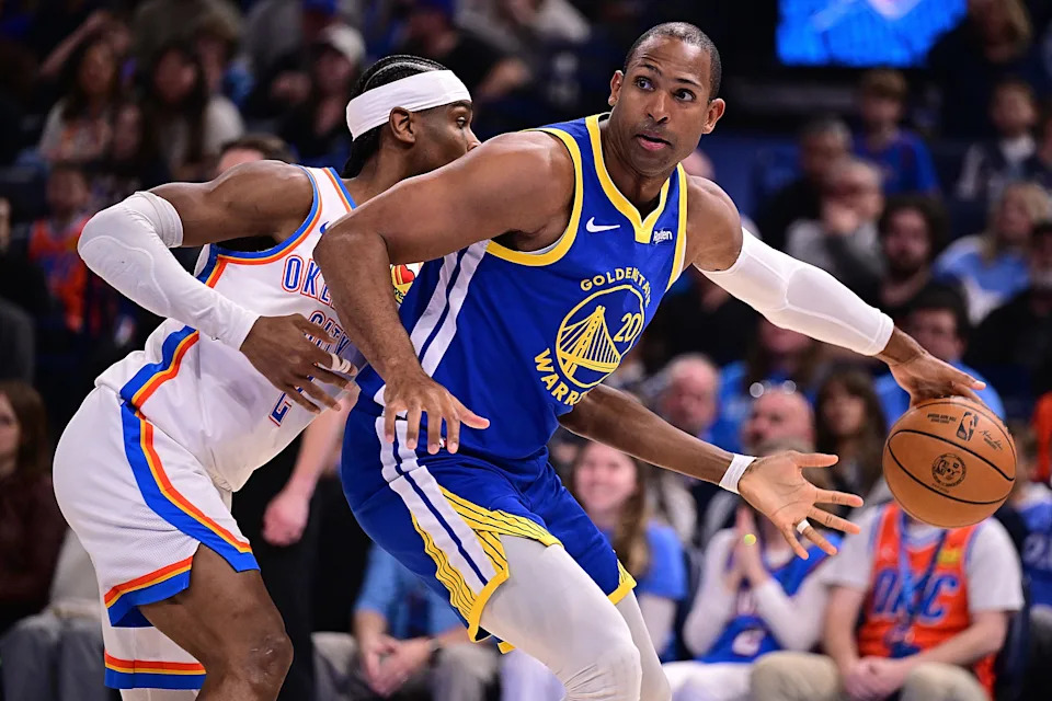 OKLAHOMA CITY, OKLAHOMA - MARCH 7: Al Horford #20 of the Golden State Warriors handles the ball while being defended by Shai Gilgeous-Alexander #2 of the Oklahoma City Thunder during the first half at Paycom Center on March 7, 2026 in Oklahoma City, Oklahoma. NOTE TO USER: User expressly acknowledges and agrees that, by downloading and or using this photograph, User is consenting to the terms and conditions of the Getty Images License Agreement. (Photo by Joshua Gateley/Getty Images)