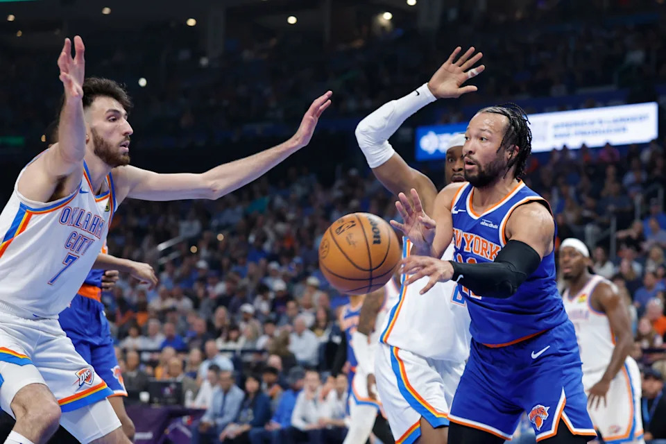 Mar 29, 2026; Oklahoma City, Oklahoma, USA; New York Knicks guard Jalen Brunson (11) passes as Oklahoma City Thunder center Chet Holmgren (7) defends during the first half at Paycom Center. Mandatory Credit: Alonzo Adams-Imagn Images