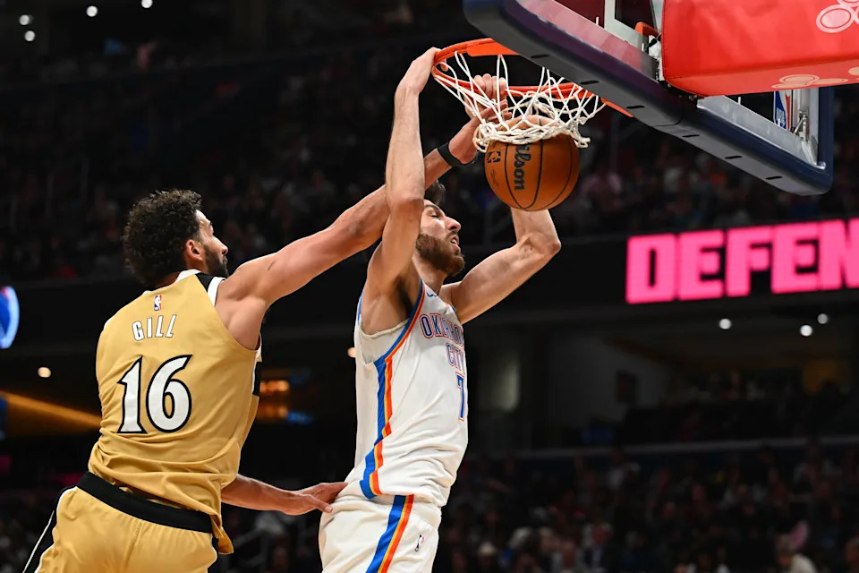 Mar 21, 2026; Washington, District of Columbia, USA; Oklahoma City Thunder center/forward Chet Holmgren (7) dunks as Washington Wizards forward Anthony Gill (16) defends during the second half at Capital One Arena. Mandatory Credit: Brad Mills-Imagn Images