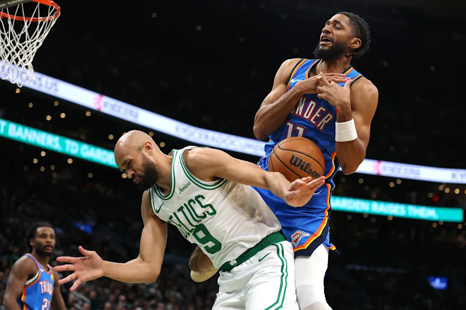BOSTON, MASSACHUSETTS - MARCH 25: Isaiah Joe #11 of the Oklahoma City Thunder and Derrick White #9 of the Boston Celtics collide during the second half at TD Garden on March 25, 2026 in Boston, Massachusetts. The Celtics defeat the Thunder 119-109. NOTE TO USER: User expressly acknowledges and agrees that, by downloading and/or using this Photograph, user is consenting to the terms and conditions of the Getty Images License Agreement. (Photo by Maddie Meyer/Getty Images)