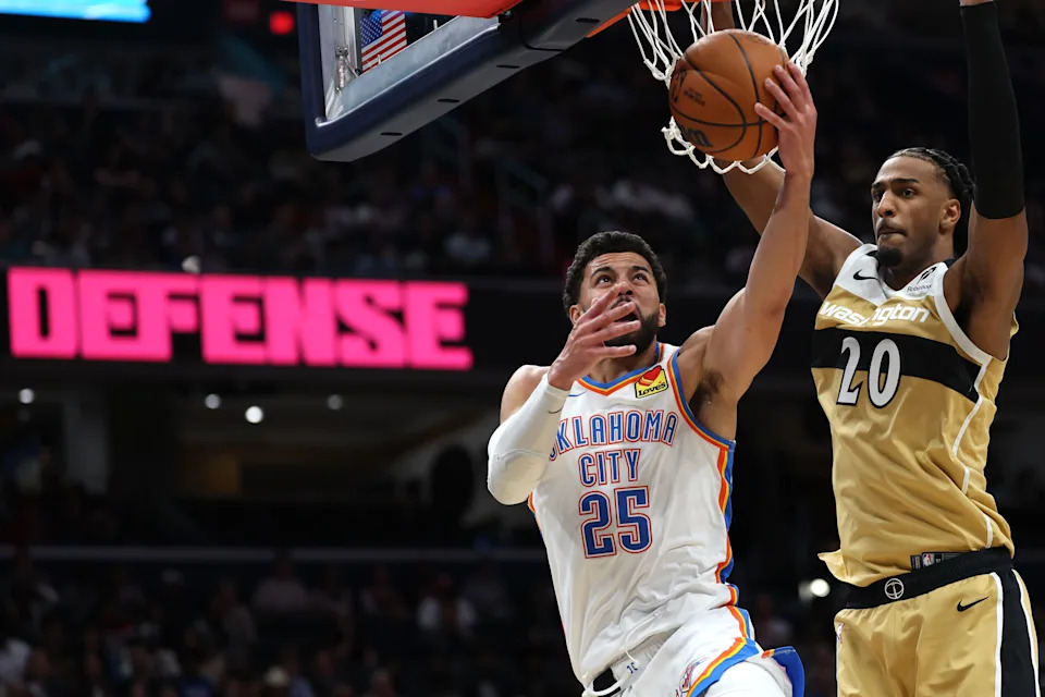 WASHINGTON, DC - MARCH 21: Ajay Mitchell #25 of the Oklahoma City Thunder shoots in front of Alex Sarr #20 of the Washington Wizards during the first half at Capital One Arena on March 21, 2026 in Washington, DC. NOTE TO USER: User expressly acknowledges and agrees that, by downloading and or using this photograph, User is consenting to the terms and conditions of the Getty Images License Agreement. (Photo by Patrick Smith/Getty Images)