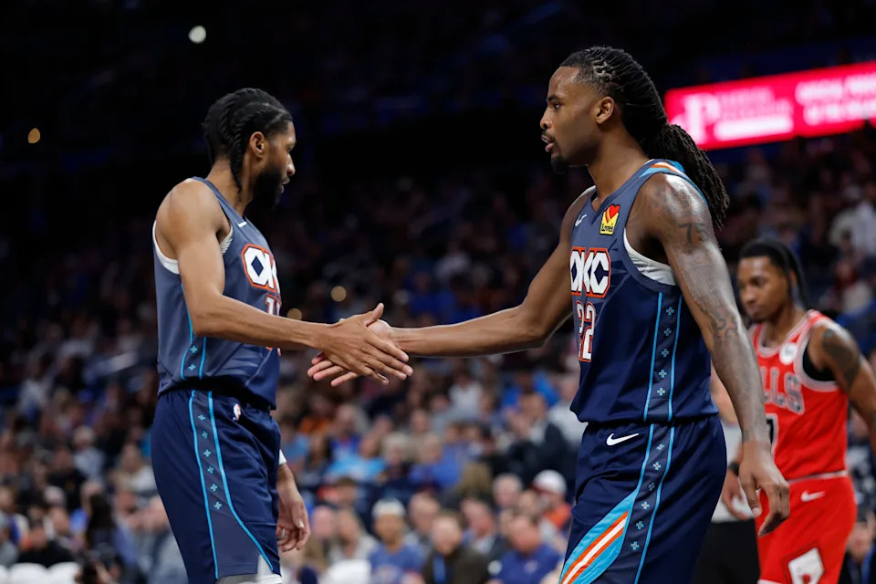 Mar 27, 2026; Oklahoma City, Oklahoma, USA; Oklahoma City Thunder guard Isaiah Joe (11) and guard Cason Wallace (22) celebrate after a basket against the Chicago Bulls during the second half at Paycom Center. Mandatory Credit: Alonzo Adams-Imagn Images