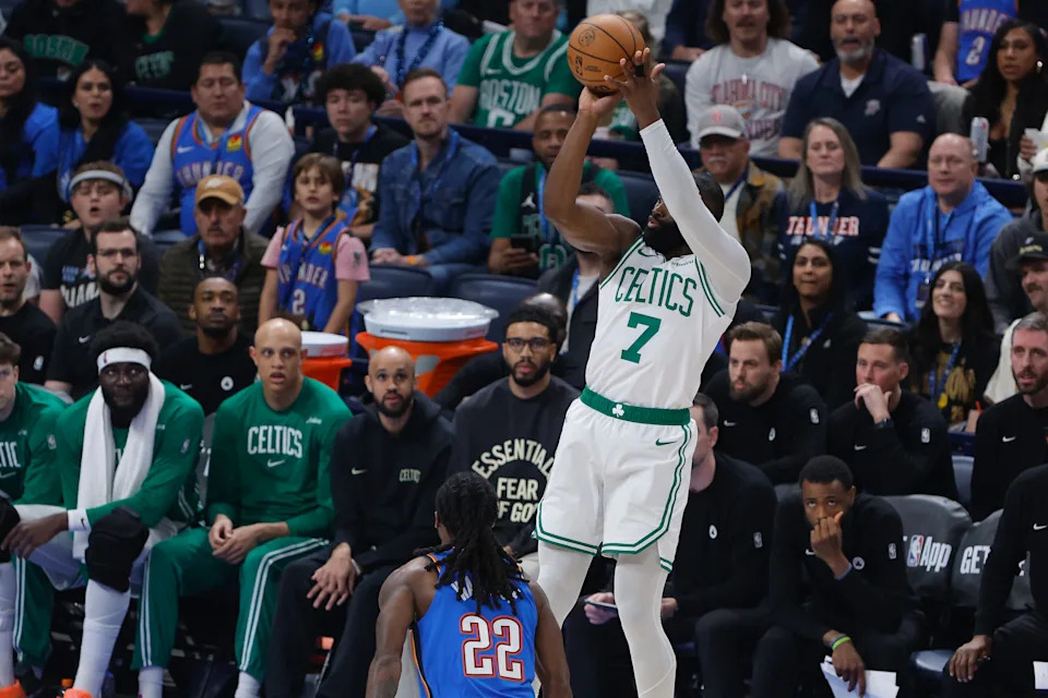 Mar 12, 2026; Oklahoma City, Oklahoma, USA; Boston Celtics guard/forward Jaylen Brown (7) shoots over Oklahoma City Thunder guard Cason Wallace (22) during the first quarter at Paycom Center. Mandatory Credit: Alonzo Adams-Imagn Images