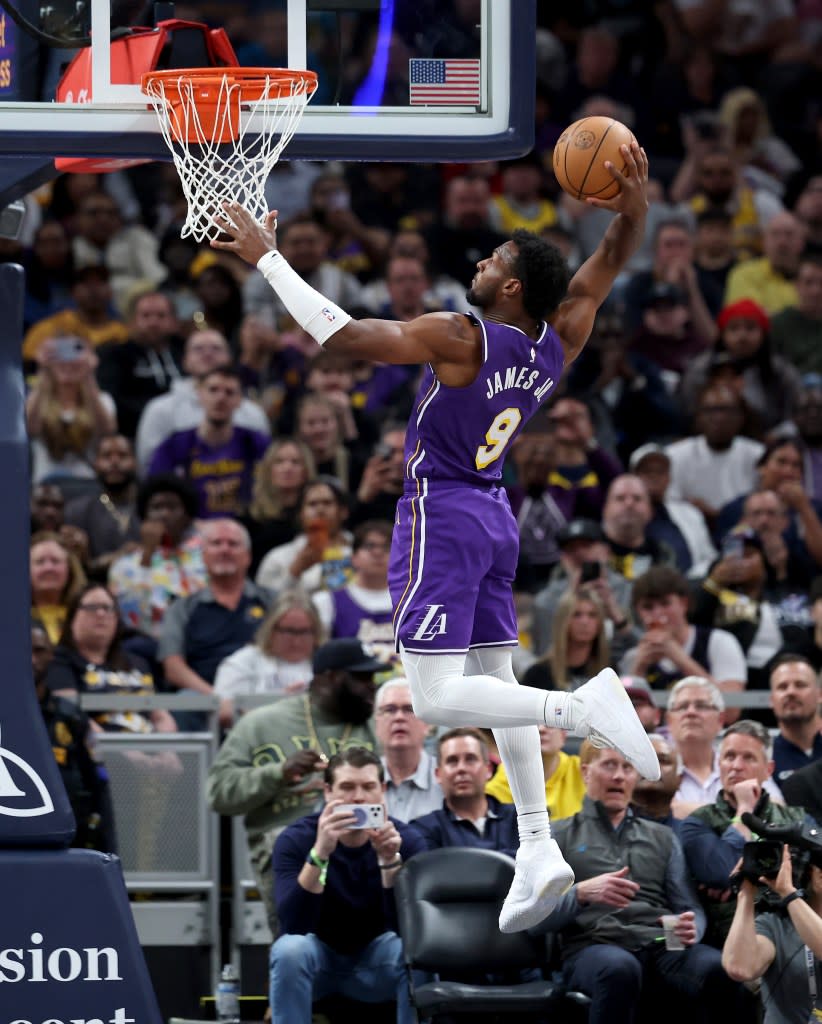 Lakers guard Bronny James gets a dunk against the Indiana Pacers during the game in Indianapolis, March 25. Getty Images