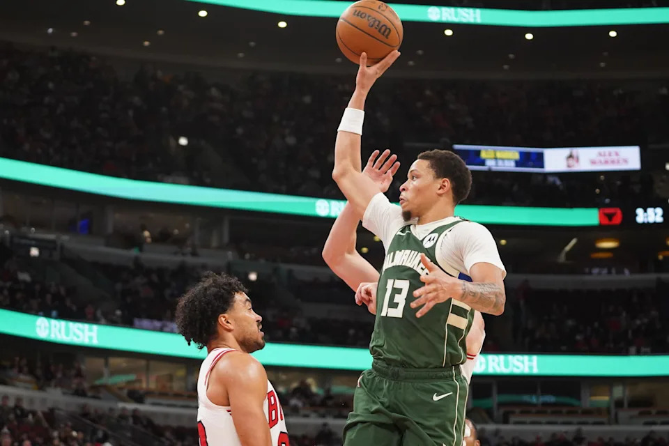 Mar 1, 2026; Chicago, Illinois, USA; Chicago Bulls guard Tre Jones (30) defends Milwaukee Bucks guard Ryan Rollins (13) during the second half at United Center. Mandatory Credit: David Banks-Imagn Images