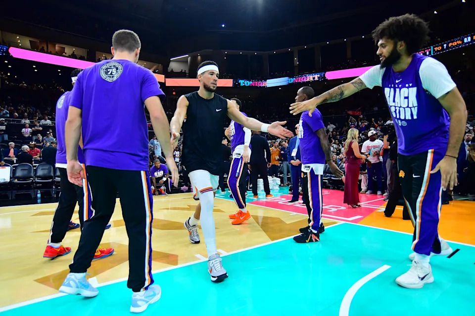SAN ANTONIO, TX – FEBRUARY 19: Devin Booker #1 of the Phoenix Suns is introduced before the game against the San Antonio Spurs on February 19, 2026 at the Frost Bank Center in San Antonio, Texas. | NBAE via Getty Images