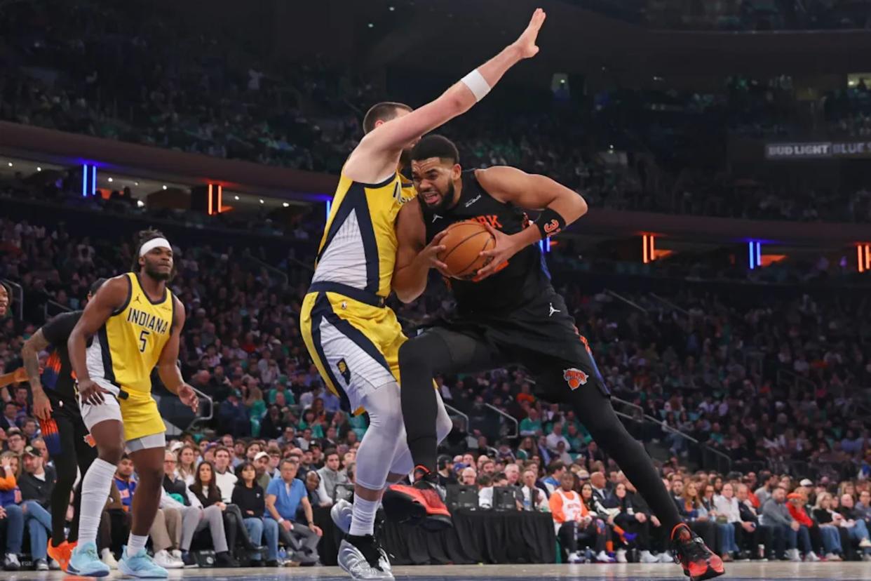 An image collage containing 1 images, Image 1 shows Karl-Anthony Towns drives on Ivica Zubac during the Knicks' blowout win over the Pacers on March 17, 2026 at the Garden