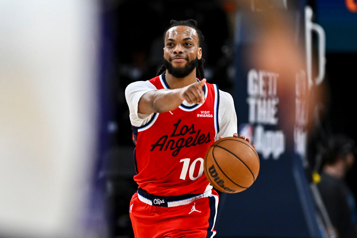 LA Clippers guard Darius Garland (10) points against the Sacramento Kings during the second quarter at Intuit Dome.<br> © Jonathan Hui-Imagn Images