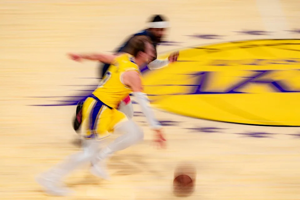 Los Angeles Lakers guard Luke Kennard (10) dribbling during an NBA basketball game against the Washington Wizards on March 30th, 2026 in Los Angeles, CA.