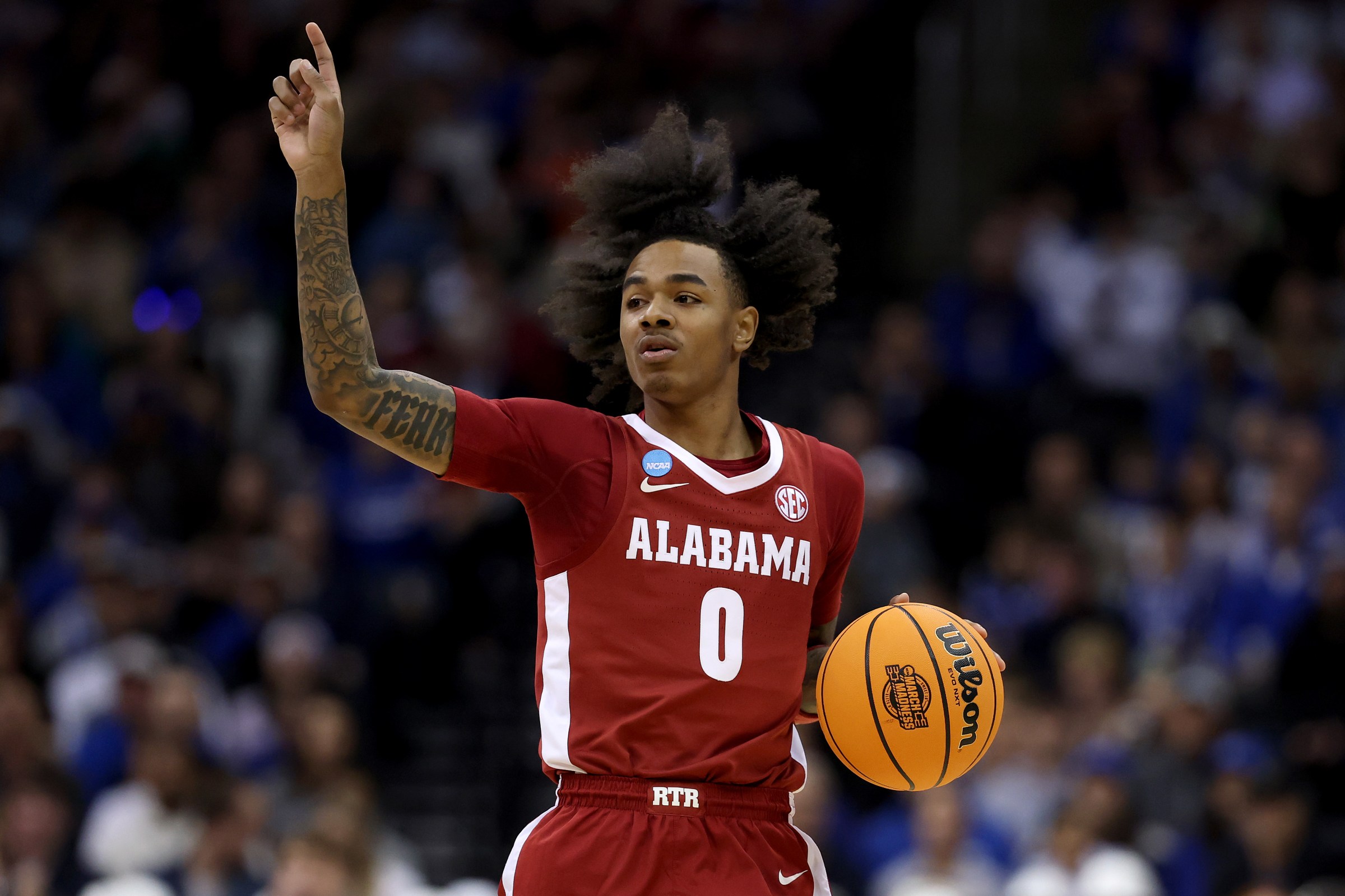 NEWARK, NEW JERSEY - MARCH 29: Labaron Philon #0 of the Alabama Crimson Tide dribbles the ball against the Duke Blue Devils during the first half in the East Regional Elite Eight round of the NCAA Men’s Basketball Tournament at Prudential Center on March 29, 2025 in Newark, New Jersey. (Photo by Patrick Smith/Getty Images)