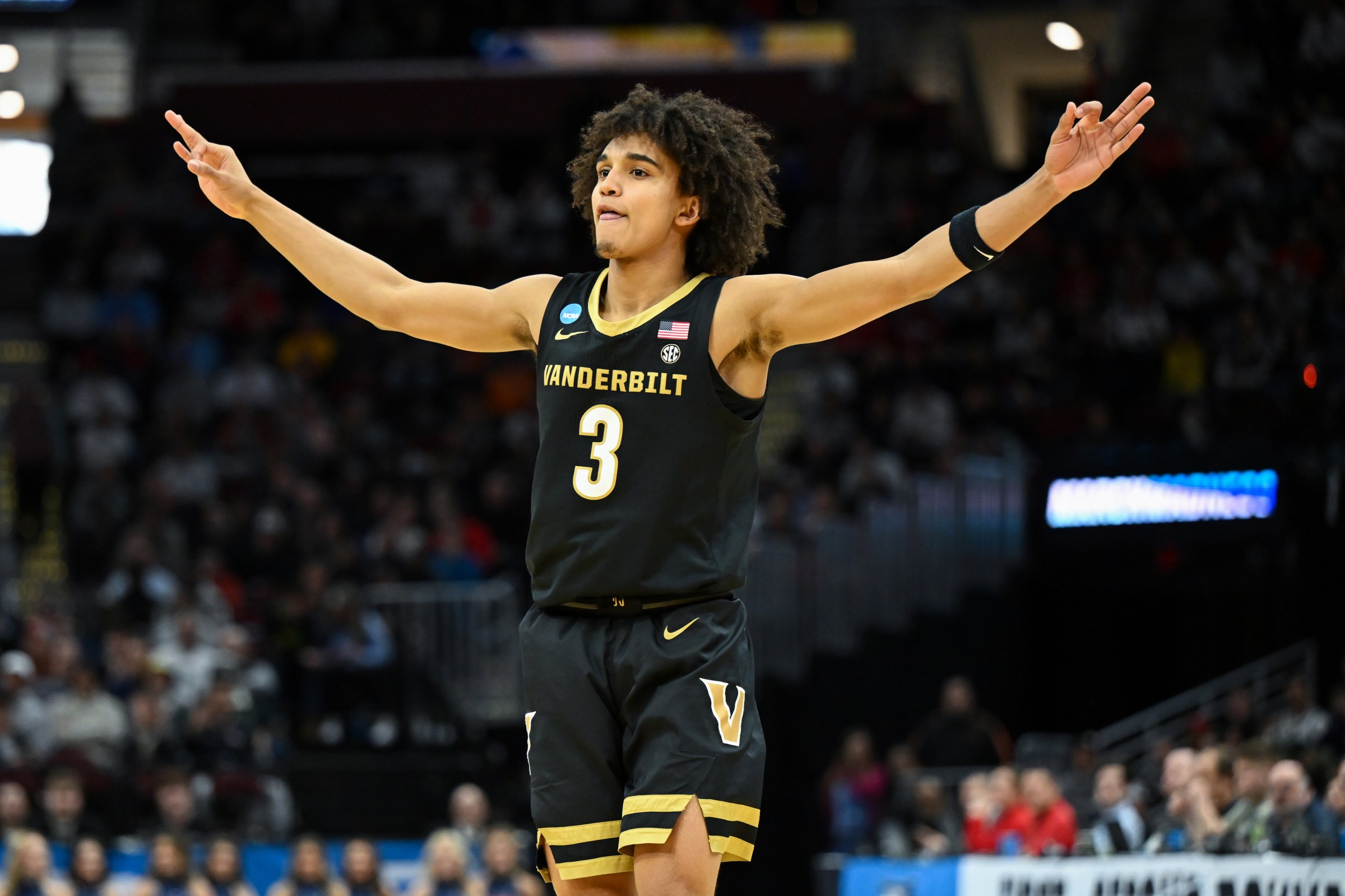 CLEVELAND, OHIO - MARCH 21: Tyler Tanner #3 of the Vanderbilt Commodores celebrates making a three-point basket during the second half in the first round of the NCAA Men’s Basketball Tournament against the St. Mary’s Gaels at Rocket Arena on March 21, 2025 in Cleveland, Ohio. (Photo by Nick Cammett/Getty Images)