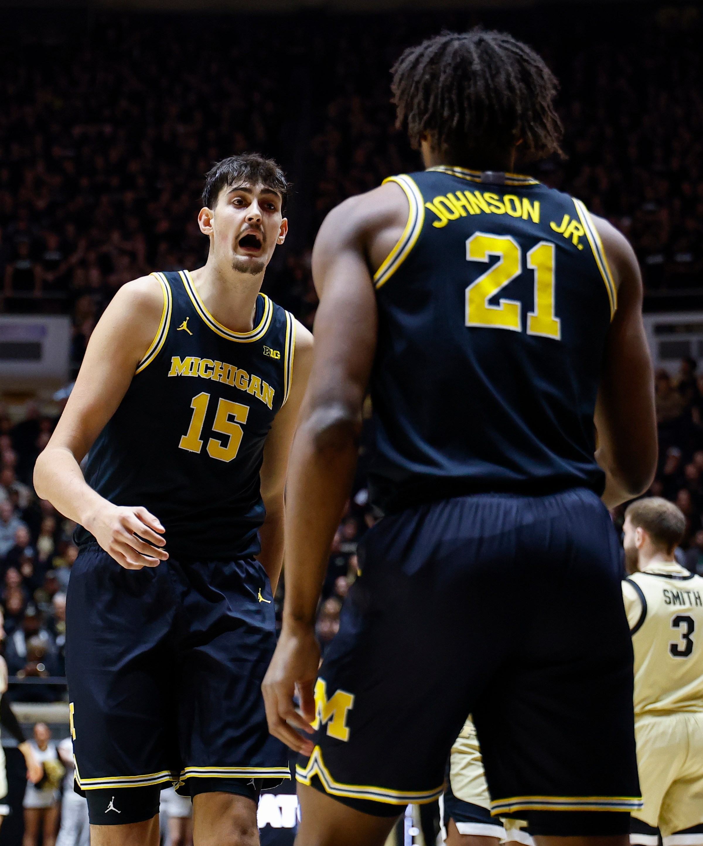 WEST LAFAYETTE, IN - FEBRUARY 17: Michigan Wolverines center Aday Mara (15) talks to Michigan Wolverines forward Morez Johnson Jr. (21) in the first half of play during a men’s college basketball game between the Michigan Wolverines and the Purdue Boilermakers on February 17, 2026 at Mackey Arena in West Lafayette, IN. (Photo by Jeffrey Brown/Icon Sportswire via Getty Images)