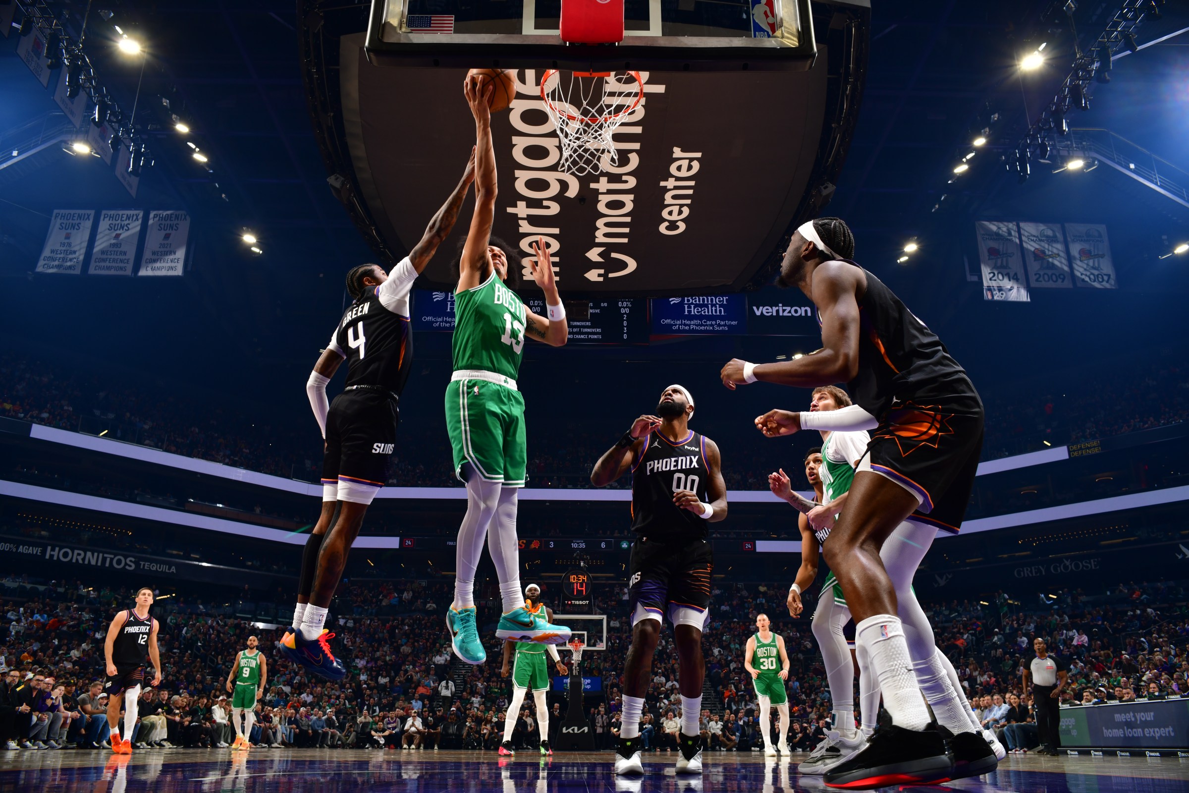 PHOENIX, AZ - FEBRUARY 24: Ron Harper Jr. #13 of the Boston Celtics drives to the basket during the game against the Phoenix Suns on February 24, 2026 at PHX Arena in Phoenix, Arizona. NOTE TO USER: User expressly acknowledges and agrees that, by downloading and or using this photograph, user is consenting to the terms and conditions of the Getty Images License Agreement. Mandatory Copyright Notice: Copyright 2026 NBAE (Photo by Barry Gossage/NBAE via Getty Images)