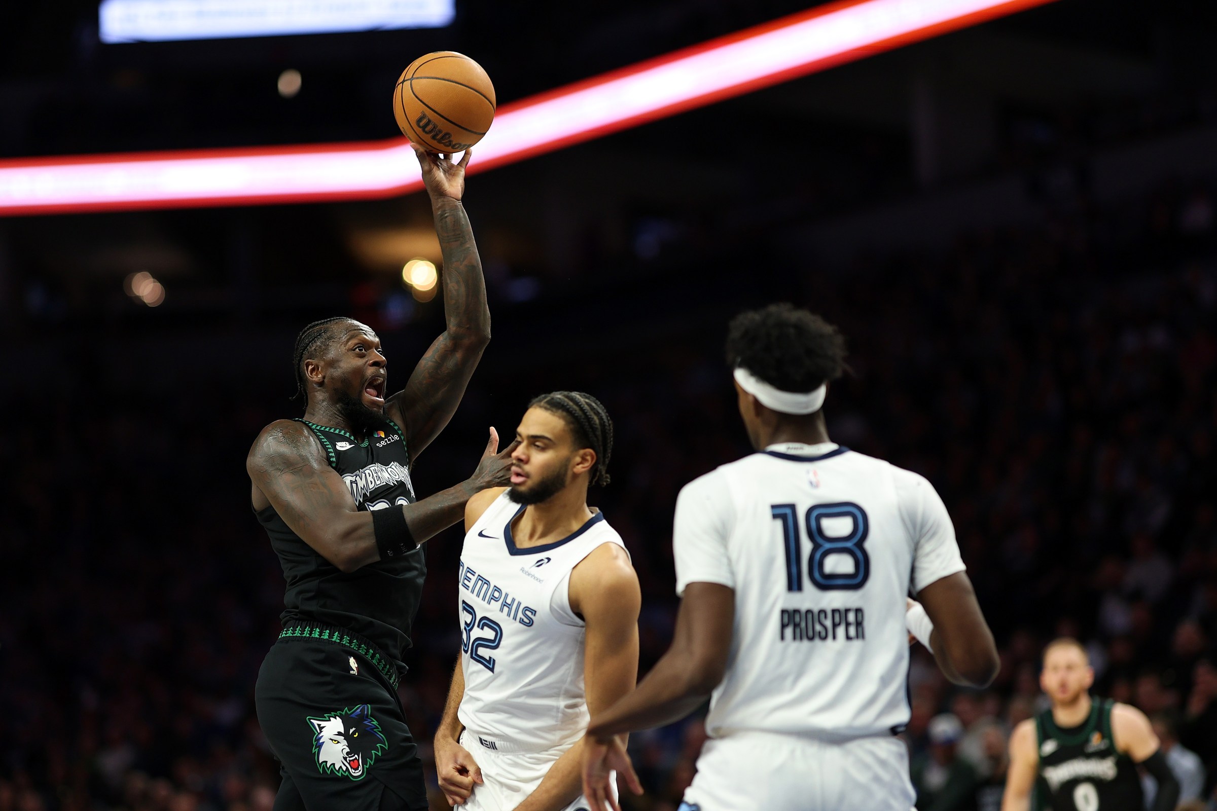 MINNEAPOLIS, MINNESOTA - MARCH 03: Julius Randle #30 of the Minnesota Timberwolves shoots the ball against Rayan Rupert #32 of the Memphis Grizzlies in the third quarter at Target Center on March 03, 2026 in Minneapolis, Minnesota. The Timberwolves defeated the Grizzlies 117-110. NOTE TO USER: User expressly acknowledges and agrees that, by downloading and or using this photograph, User is consenting to the terms and conditions of the Getty Images License Agreement. (Photo by David Berding/Getty Images)