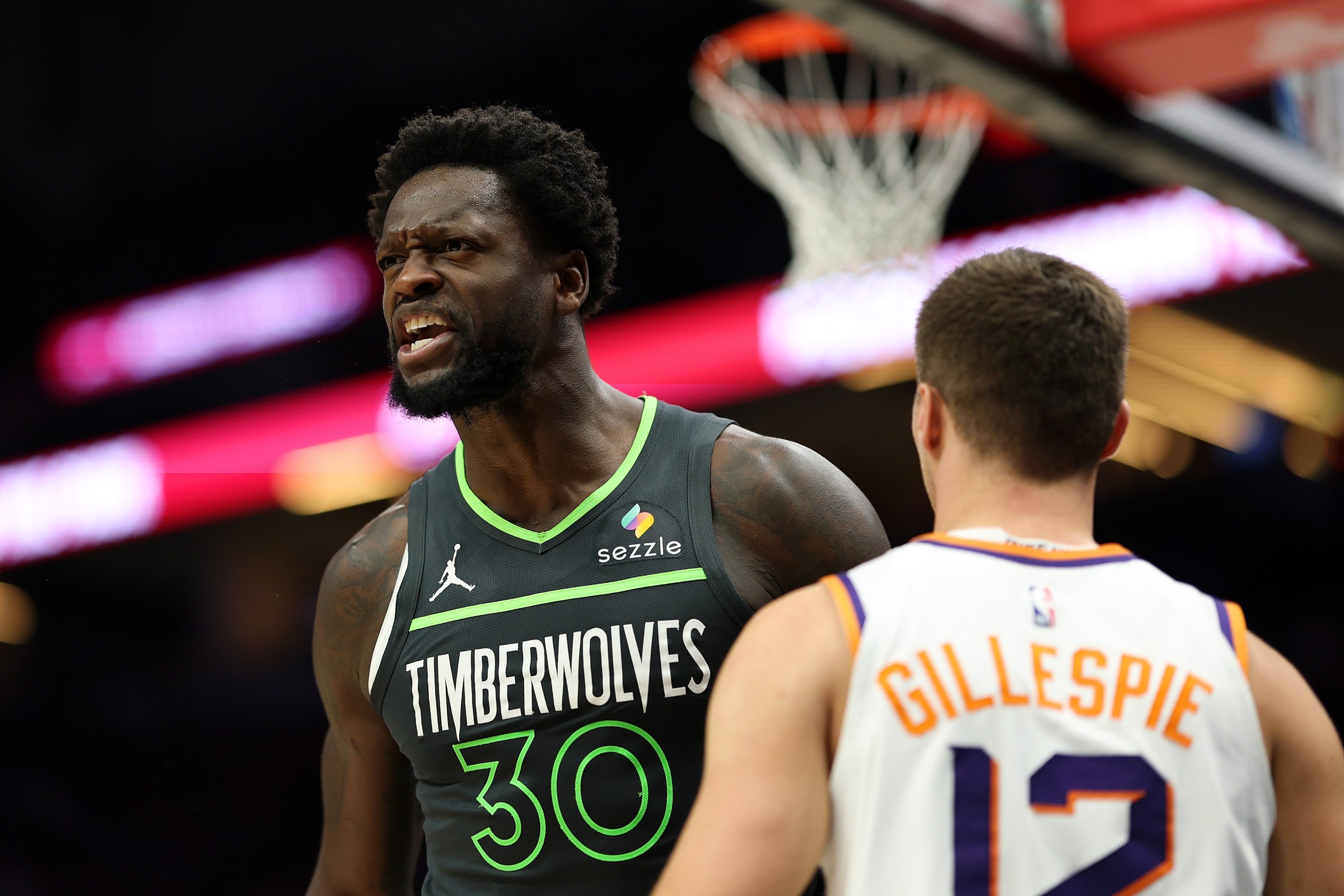 MINNEAPOLIS, MINNESOTA - MARCH 17: Julius Randle #30 of the Minnesota Timberwolves celebrates his dunk against the Phoenix Suns in the fourth quarter at Target Center on March 17, 2026 in Minneapolis, Minnesota. The Timberwolves defeated the Suns 116-104. NOTE TO USER: User expressly acknowledges and agrees that, by downloading and or using this photograph, User is consenting to the terms and conditions of the Getty Images License Agreement. (Photo by David Berding/Getty Images)
