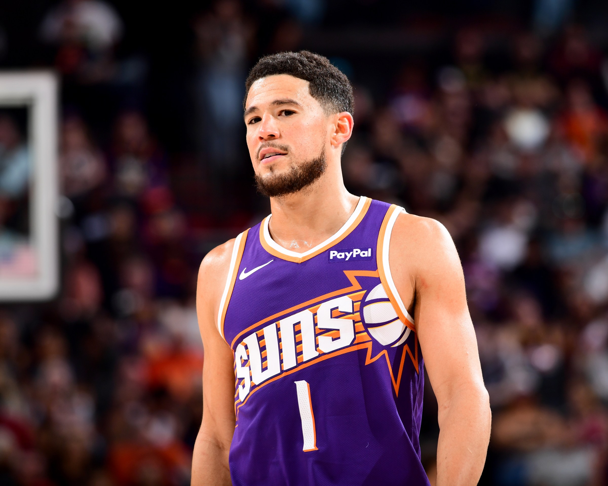 PHOENIX, AZ - MARCH 22: Devin Booker #1 of the Phoenix Suns smiles during the game against the Toronto Raptors on March 22, 2026 at PHX Arena in Phoenix, Arizona. NOTE TO USER: User expressly acknowledges and agrees that, by downloading and or using this photograph, user is consenting to the terms and conditions of the Getty Images License Agreement. Mandatory Copyright Notice: Copyright 2026 NBAE (Photo by Kate Frese/NBAE via Getty Images)