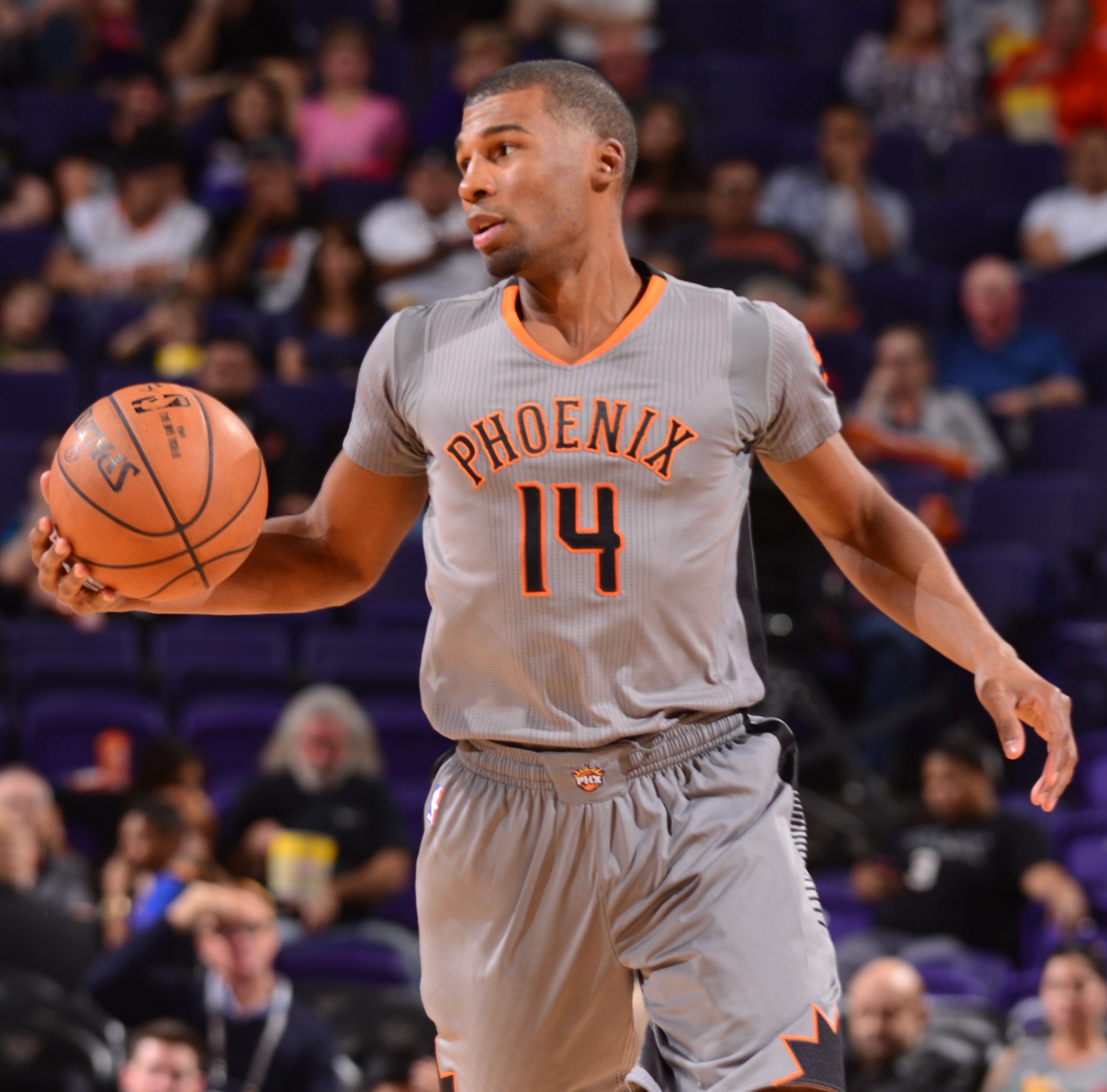 PHOENIX, AZ - FEBRUARY 25: Ronnie Price #14 of the Phoenix Suns drives up the court against the Brooklyn Nets during the game on February 25, 2016 at Talking Stick Resort Arena in Phoenix, Arizona. NOTE TO USER: User expressly acknowledges and agrees that, by downloading and or using this Photograph, user is consenting to the terms and conditions of the Getty Images License Agreement. Mandatory Copyright Notice: Copyright 2016 NBAE (Photo by Barry Gossage/NBAE via Getty Images)