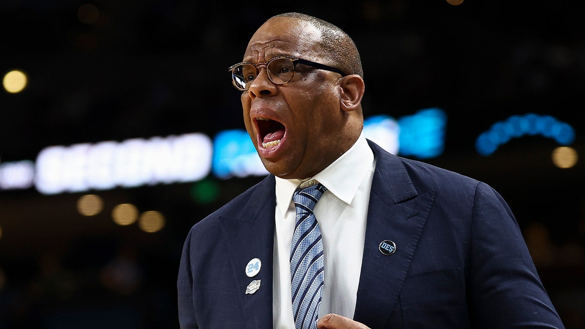 Hubert Davis yells on court