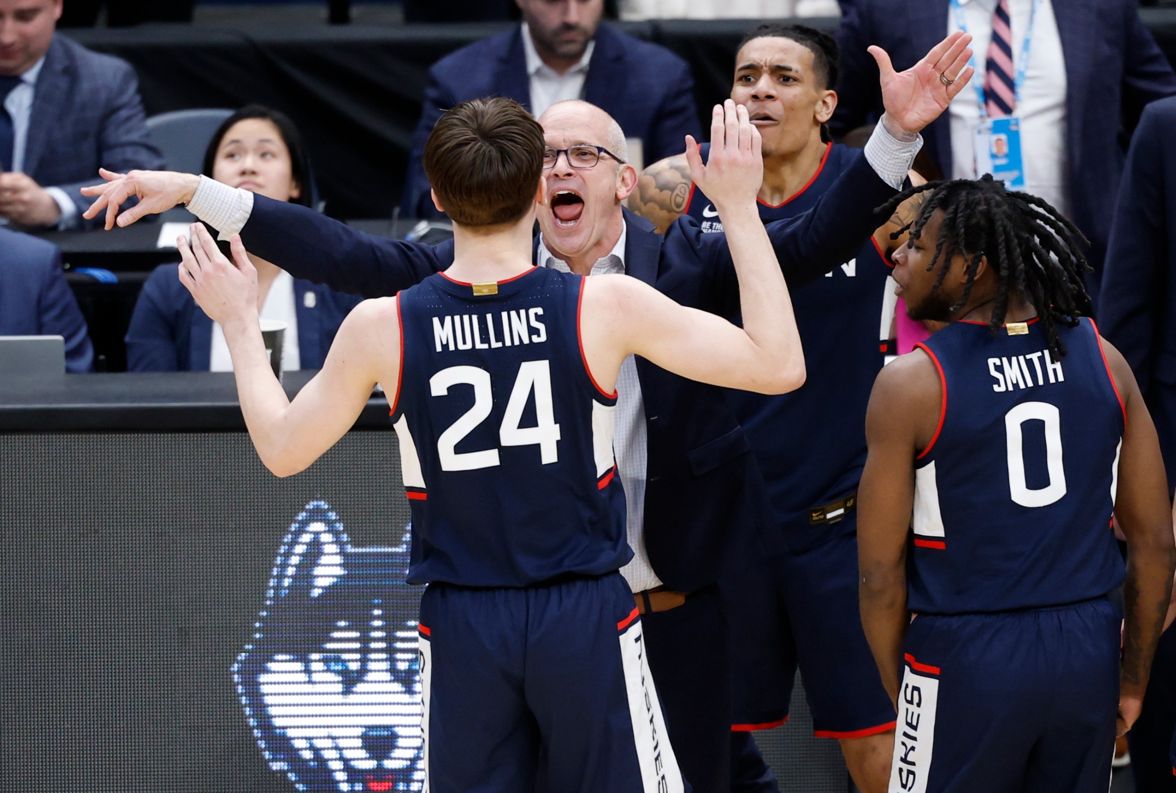 Mar 29, 2026; Washington, DC, USA; UConn Huskies head coach Dan Hurley congratulates UConn Huskies guard Braylon Mullins (24) after he made the game-winning three-point basket against the Duke Blue Devils in the second half during an Elite Eight game of the East Regional of the men’s 2026 NCAA Tournament at Capital One Arena. Mandatory Credit: Amber Searls-Imagn Images