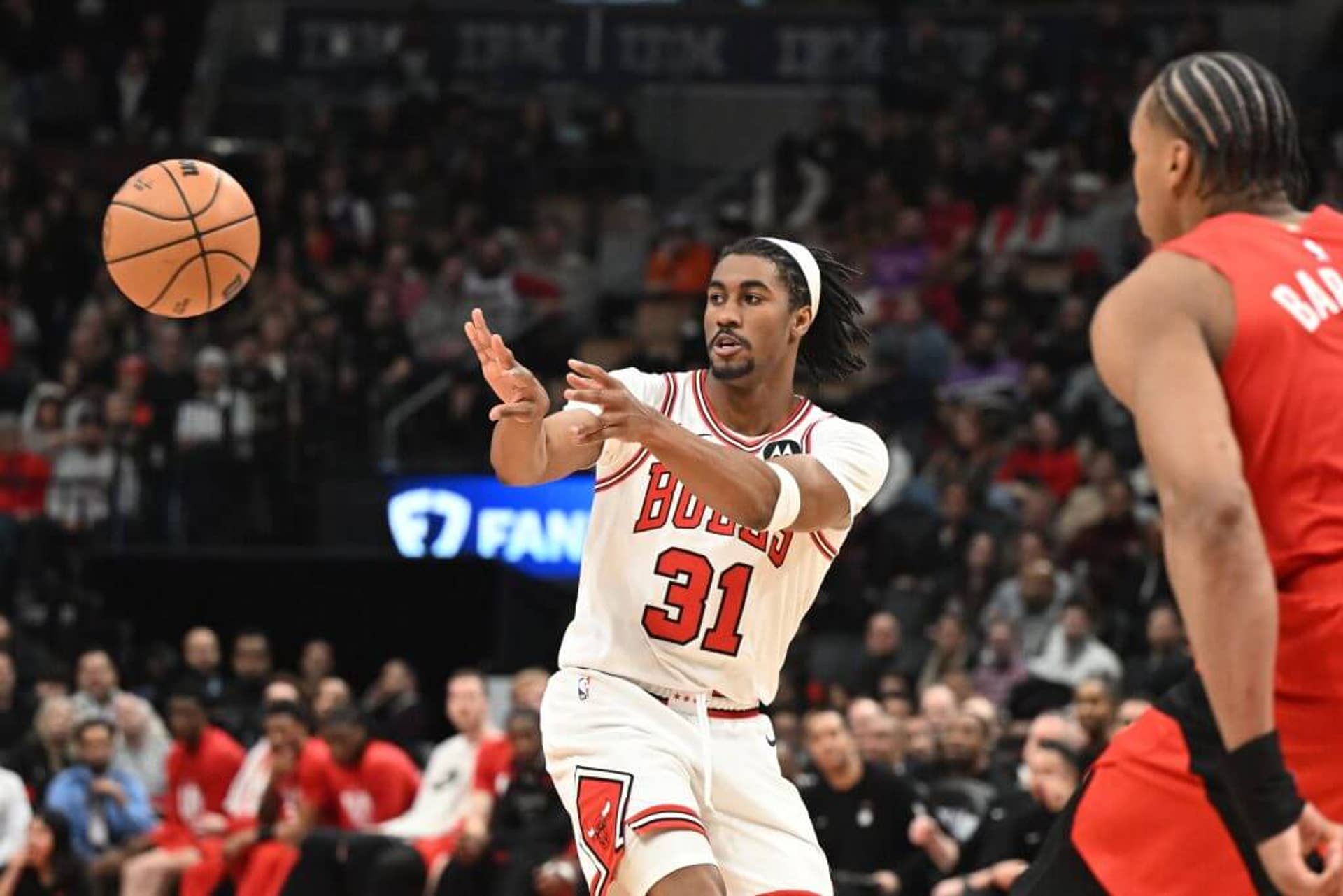 Chicago Bulls guard Jaden Ivey passes against the Toronto Raptors in the second half at Scotiabank Arena.
