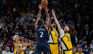 LA Clippers forward Kawhi Leonard (2) shoots the game winning shot against Indiana Pacers guard Aaron Nesmith (23), center Jay Huff (32) and guard Andrew Nembhard (2) in the second half at Gainbridge Fieldhouse.