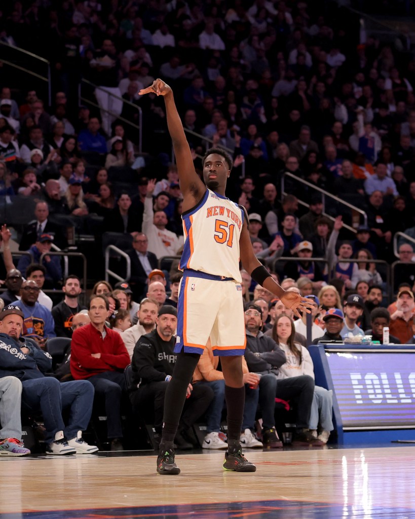 New York Knicks forward Mohamed Diawara (51) watches his three-point shot.