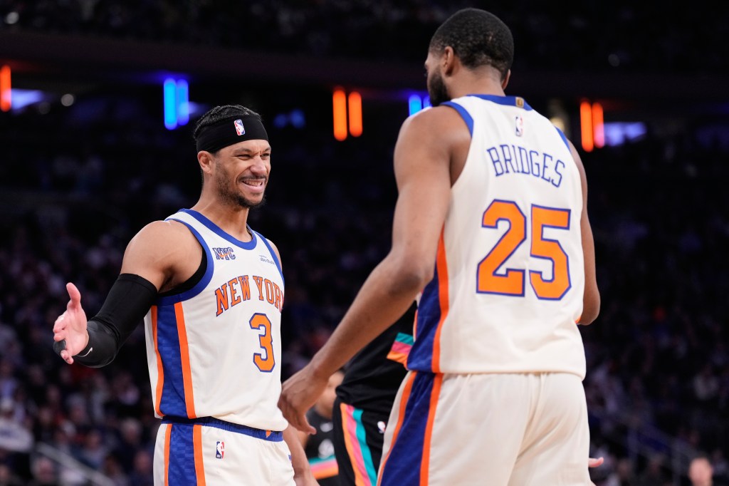 Josh Hart celebrating with Mikal Bridges during an NBA game.