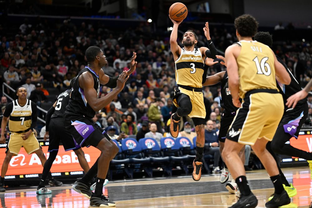 Young Dazzles in First Game as Wizard Despite Team Loss to Jazz