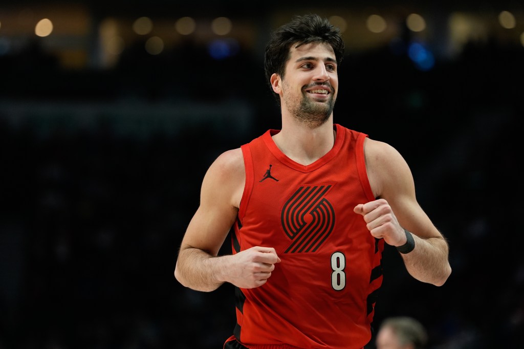 Portland Trail Blazers forward Deni Avdija reacts during the second half of an NBA basketball game against the Washington Wizards.