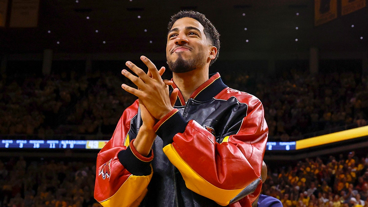 Tyrese Haliburton claps on court