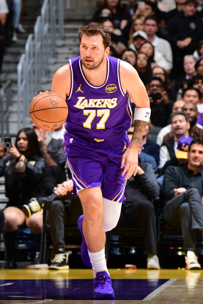 Luka Doncic #77 of the Los Angeles Lakers dribbles the ball during the game against the Brooklyn Nets.