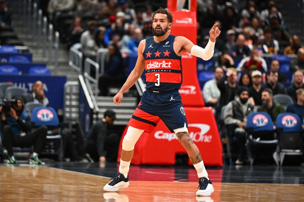 Washington Wizards guard Trae Young (3) on the court against the Golden State Warriors.