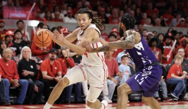 Feb 14, 2026; Houston, Texas, USA; Houston Cougars guard Kingston Flemings (4) drives to the net against Kansas State Wildcats guard David Castillo (10)  in the first half at Fertitta Center. Mandatory Credit: Thomas Shea-Imagn Images