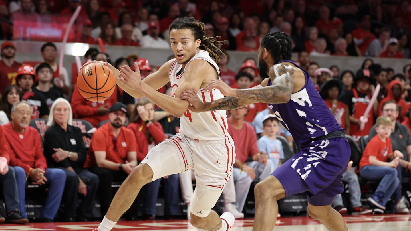 Feb 14, 2026; Houston, Texas, USA; Houston Cougars guard Kingston Flemings (4) drives to the net against Kansas State Wildcats guard David Castillo (10)  in the first half at Fertitta Center. Mandatory Credit: Thomas Shea-Imagn Images