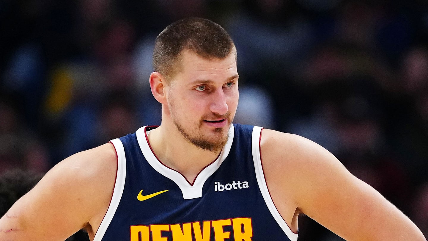 Dec 15, 2025; Denver, Colorado, USA; Denver Nuggets center Nikola Jokic (15) reacts in the second quarter against the Houston Rockets at Ball Arena. Mandatory Credit: Ron Chenoy-Imagn Images
