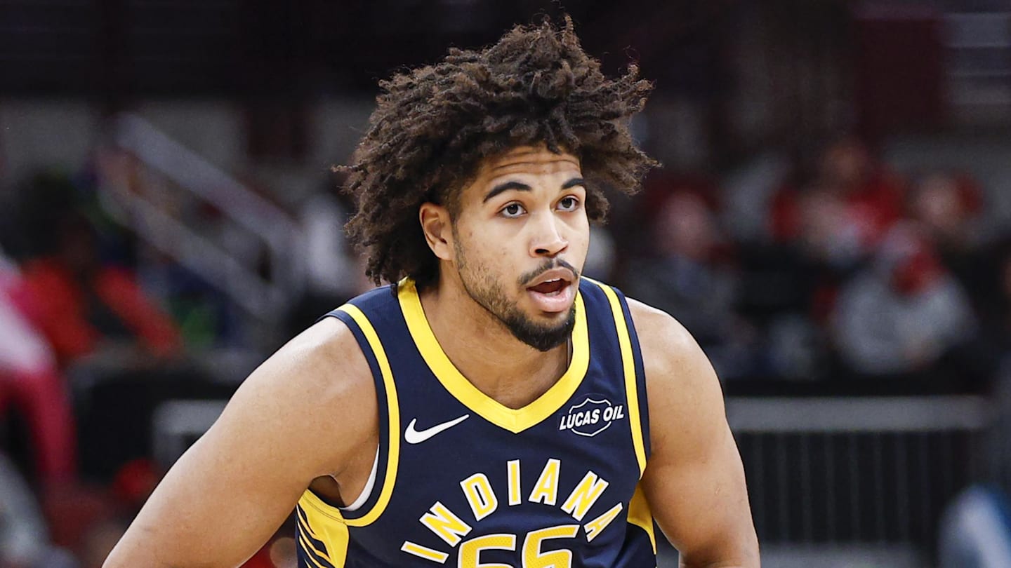 Indiana Pacers guard Ethan Thompson (55) looks to pass the ball against the Chicago Bulls during the first half at United Center.