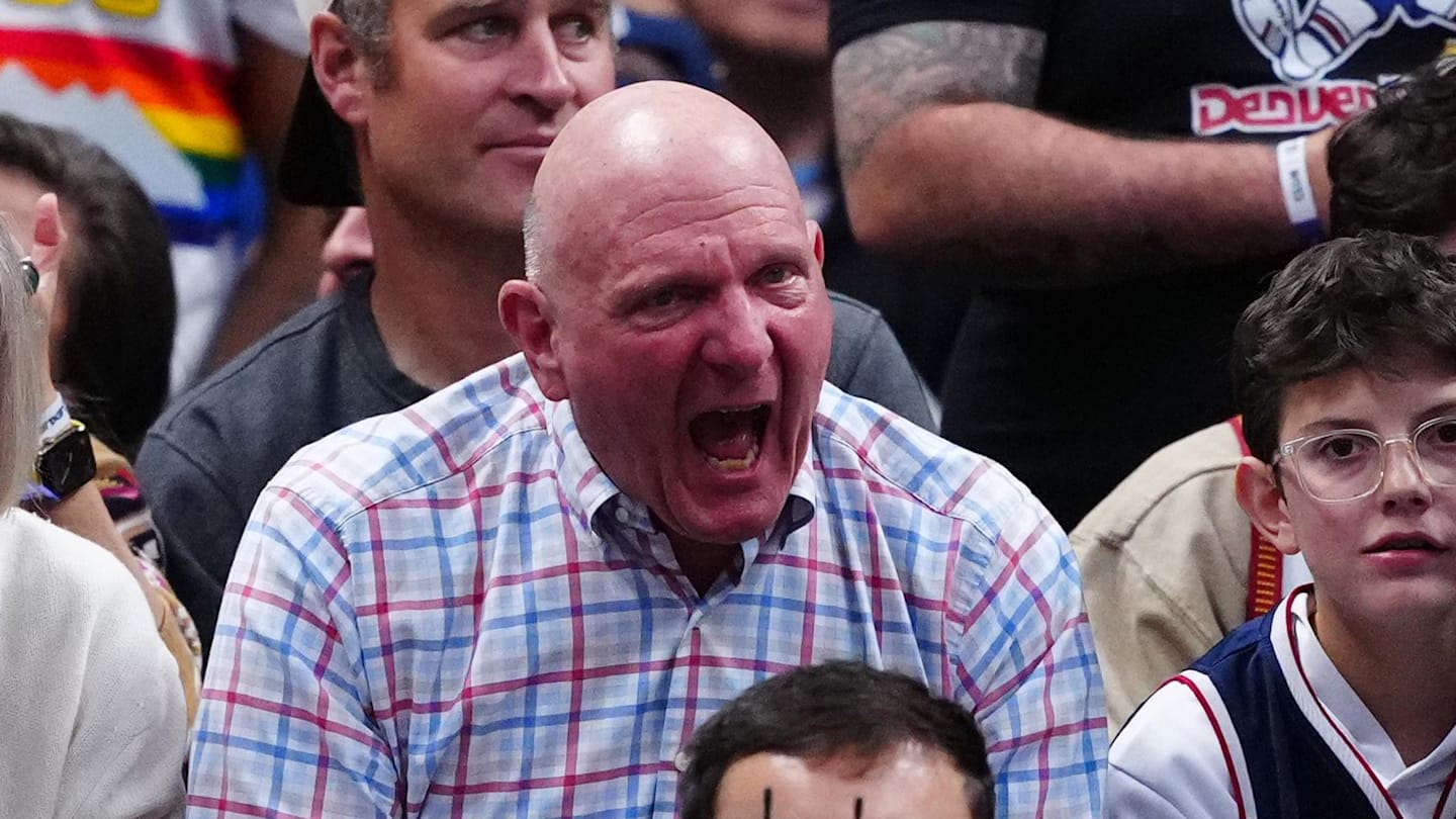 Apr 19, 2025; Denver, Colorado, USA; LA Clippers owner Steve Ballmer (center) reacts in third quarter against the Denver Nuggets at Ball Arena. Mandatory Credit: Ron Chenoy-Imagn Images