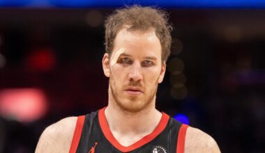 Mar 31, 2026; Detroit, Michigan, USA; Toronto Raptors Jakob Poeltl (19) walks up court against the Detroit Pistons during the second half at Little Caesars Arena. Mandatory Credit: David Reginek-Imagn Images