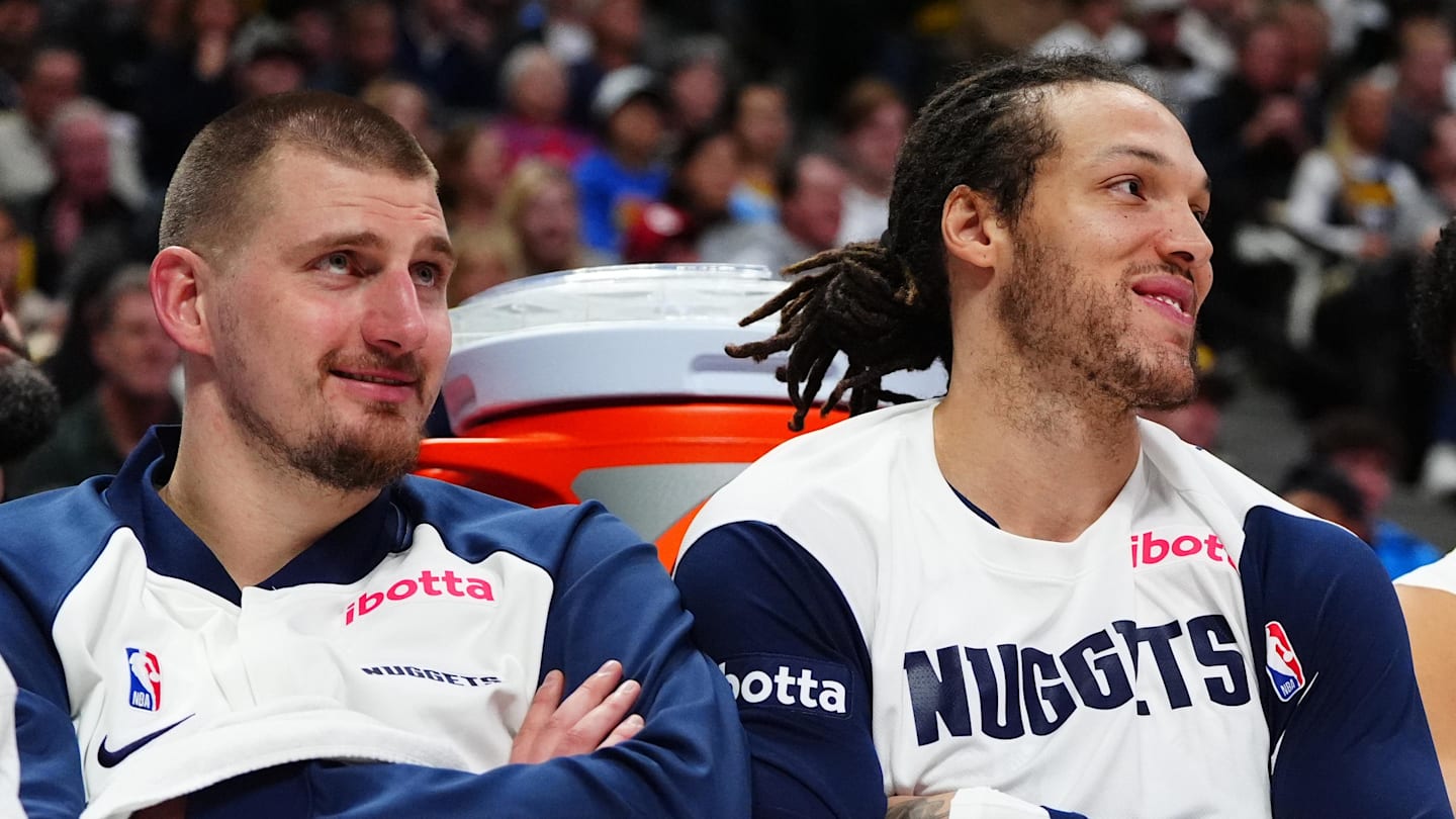 Dec 23, 2024; Denver, Colorado, USA; Denver Nuggets center Nikola Jokic (15) and forward Aaron Gordon (32) and forward Michael Porter Jr. (1) on the bench in the fourth quarter against the Phoenix Suns at Ball Arena. Mandatory Credit: Ron Chenoy-Imagn Images