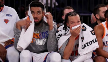 Jan 10, 2025; New York, New York, USA; New York Knicks center Karl-Anthony Towns (32) and guards Jalen Brunson (11) and Miles McBride (2) watch from the bench during the fourth quarter against the Oklahoma City Thunder at Madison Square Garden. Mandatory Credit: Brad Penner-Imagn Images